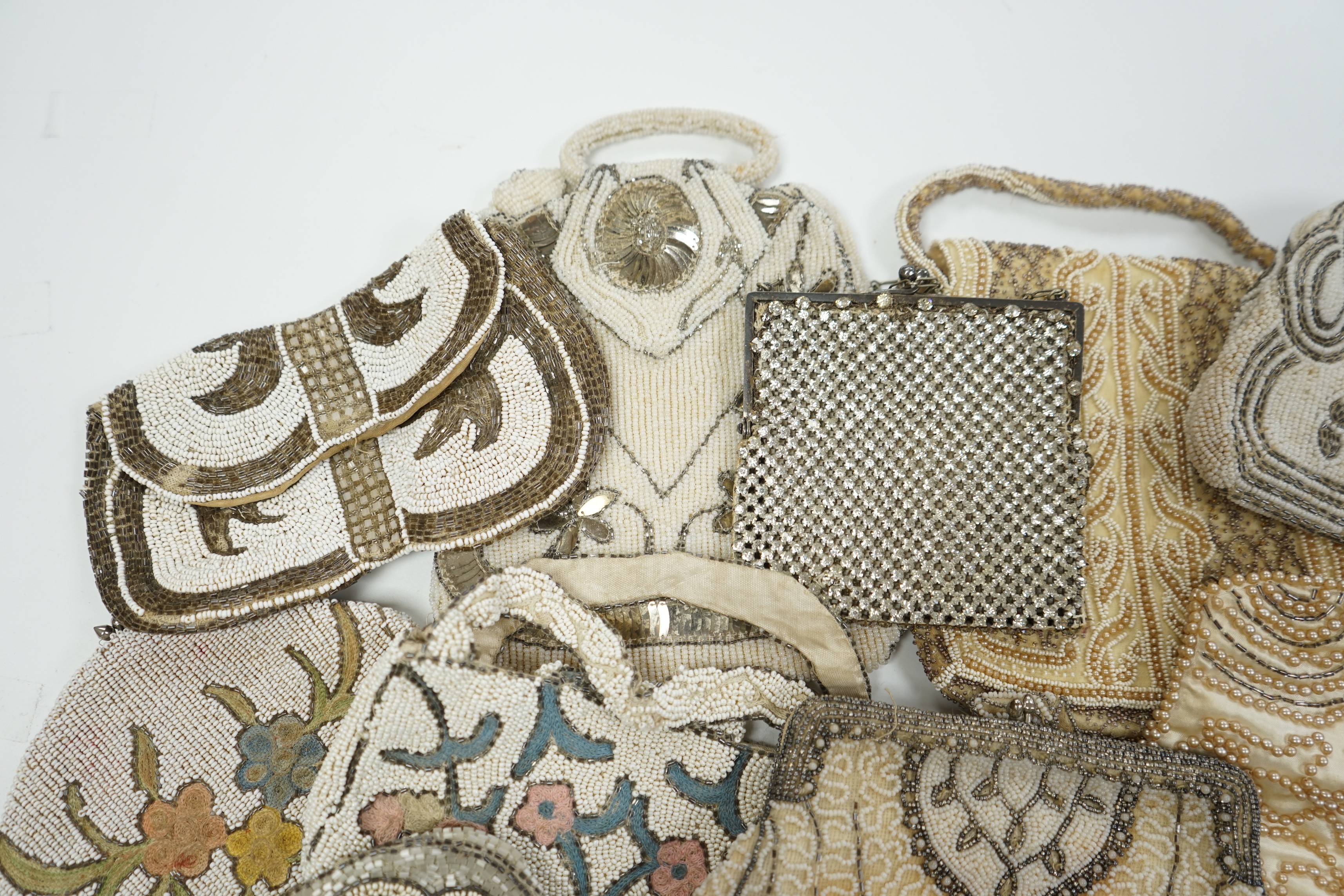 Twelve 1930’s beaded, sequin and pearl evening clutch bags and bags, some with embroidered decoration